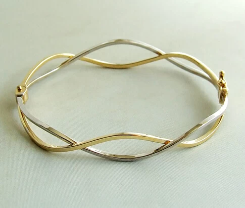 Christian bicolor gouden slavenarmband