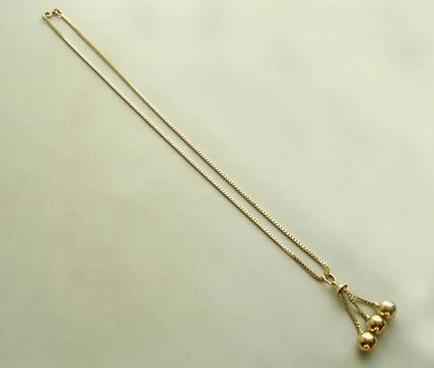 Geel gouden collier met balletjes