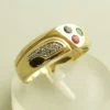 Gouden ring met saffier, diamant, robijn, smaragd