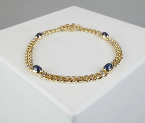 Gouden armband met diamant en saffier