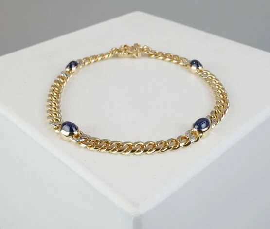 Gouden armband met diamant en saffier