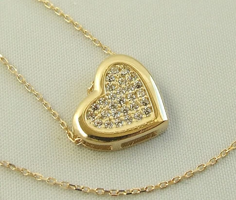 Gouden collier en zirkonia hanger