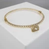 Geel gouden armband met harten hanger