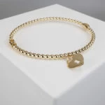 Geel gouden armband met harten hanger Geel gouden armband met harten hanger