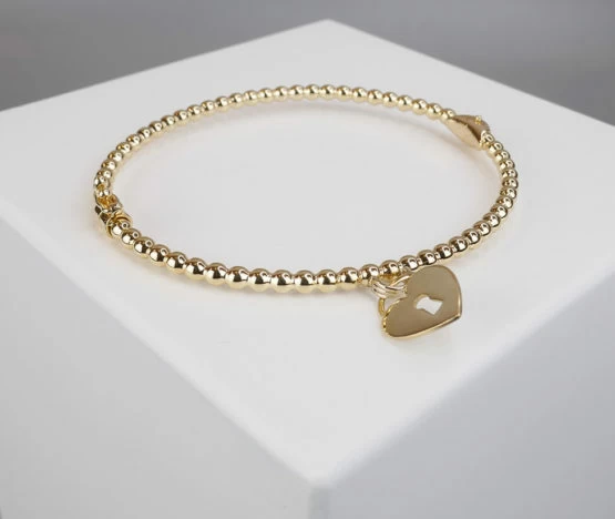Geel gouden armband met harten hanger Geel gouden armband met harten hanger