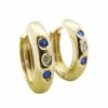 Gouden oorclips met saffier en zirkonia