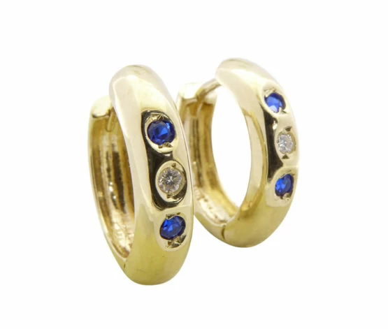 Gouden oorclips met saffier en zirkonia