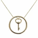 Gouden cirkel met sleutel hanger Gouden cirkel met sleutel hanger