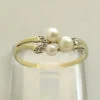 Geel gouden ring met parel en diamant