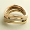 Gouden tricolor ring met diamant en saffier
