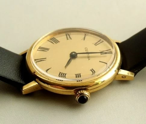 Gouden Certina horloge