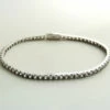 Wit gouden tennisarmband met zirkonia