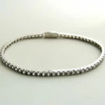 Wit gouden tennisarmband met zirkonia
