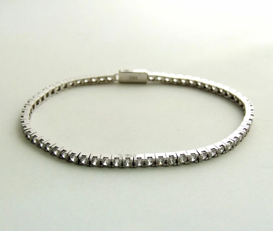 Wit gouden tennisarmband met zirkonia