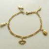 Geel gouden enkelband met bedeltjes