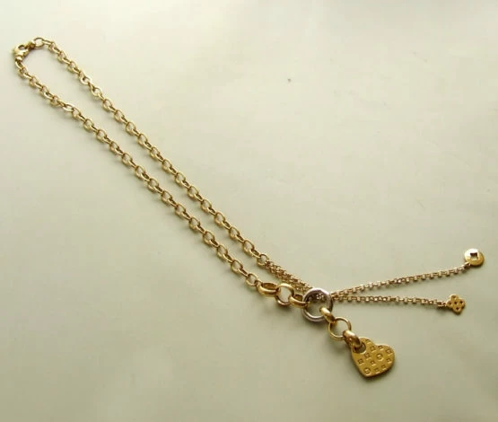 Gouden collier met hangers