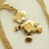 Gouden collier met teddybeer hanger