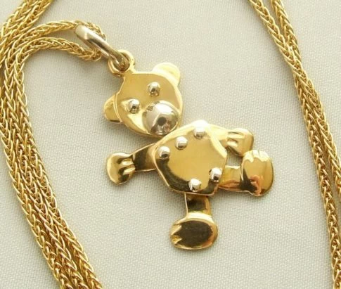 Gouden collier met teddybeer hanger