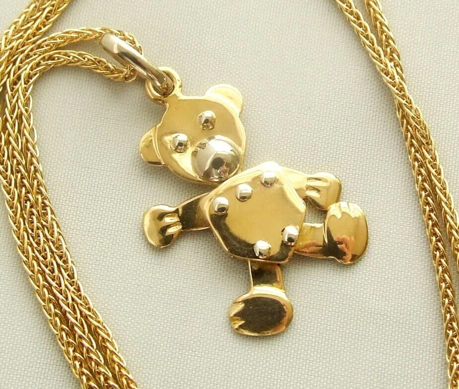 Gouden collier met teddybeer hanger