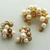 Gouden broche en oorclip set