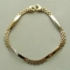 14 karaat bicolor gouden schakel armband