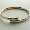 14 karaat bicolor slavenarmband halfrond model