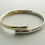 14 karaat bicolor slavenarmband halfrond model