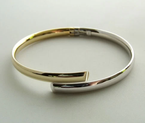 14 karaat bicolor slavenarmband halfrond model