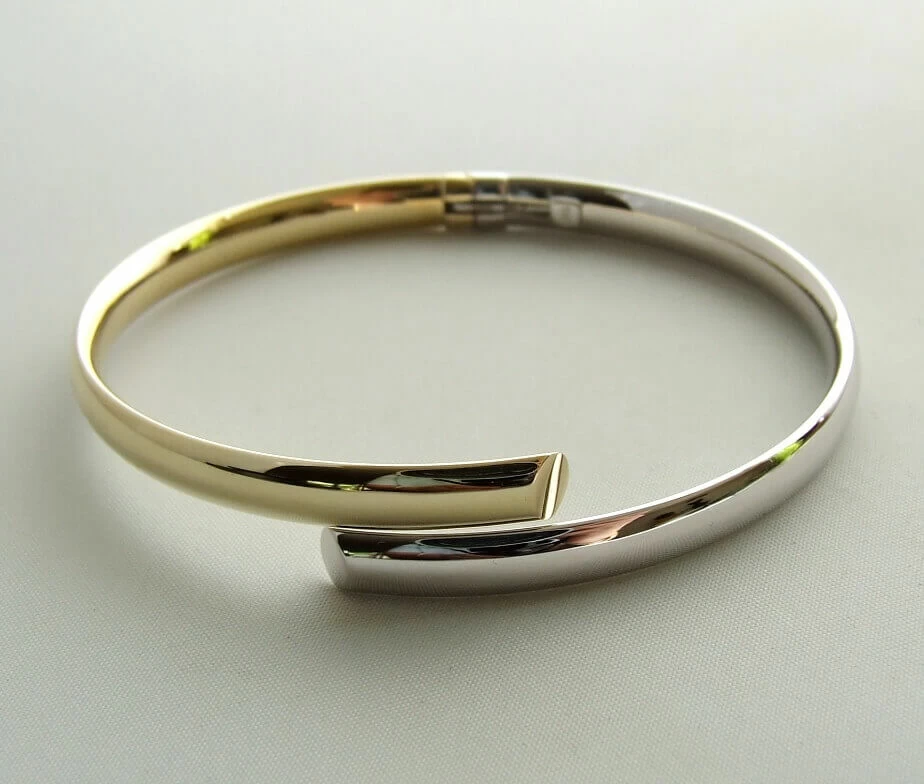 14 karaat bicolor slavenarmband halfrond model