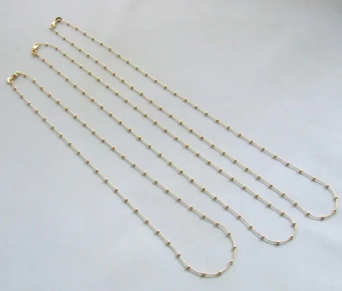 14 karaat gouden collier met balletjes