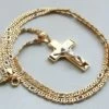 Gouden collier met kruishanger