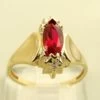 14 karaat gouden ring met robijn