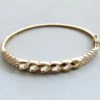 Christian gouden slavenarmband met zirkonia