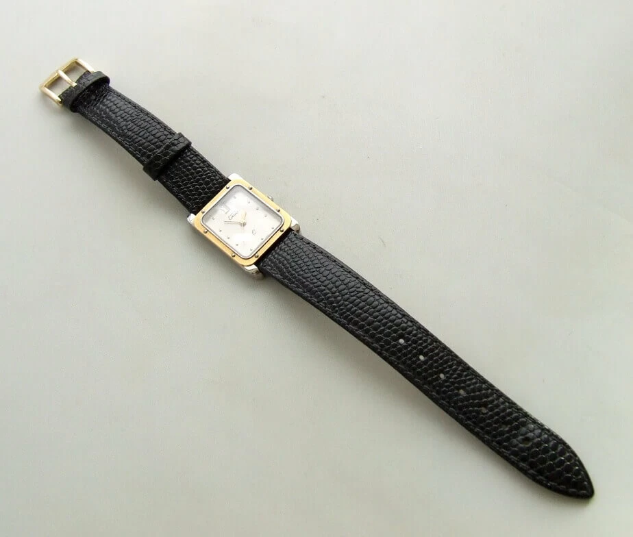 Goud op staal horloge met leren band