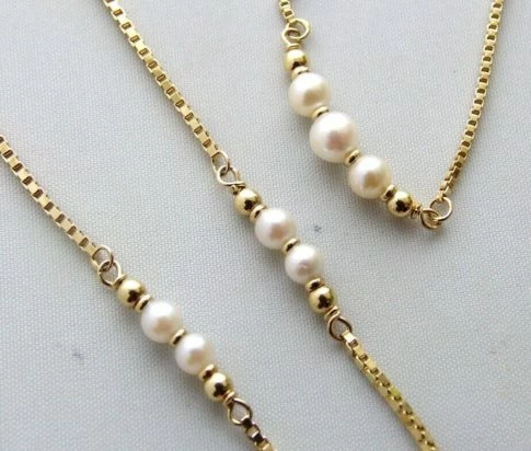 Christian geel gouden collier met parels