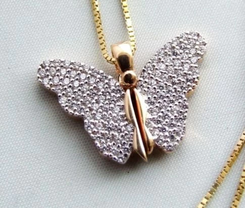 Gouden collier met vlinder hanger