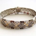 Bicolor Christian gouden armband
