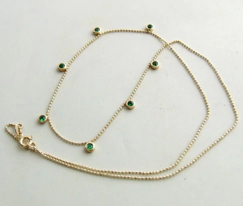 14 karaat gouden collier met smaragd