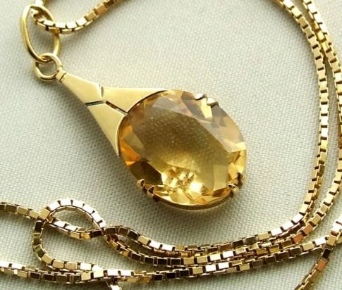 Gouden collier en hanger met citrien