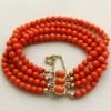Bloedkoraal armband en gouden slot