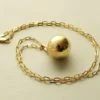 Gouden wereldbol hanger