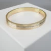 Christian gouden slavenarmband tricolor