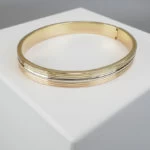 Christian gouden slavenarmband tricolor Christian gouden slavenarmband tricolor