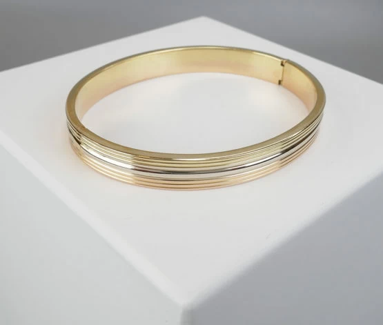Christian gouden slavenarmband tricolor Christian gouden slavenarmband tricolor