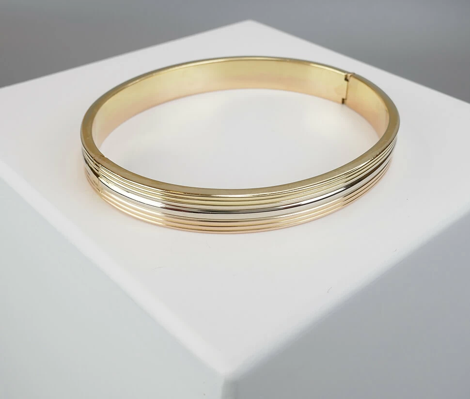 Christian gouden slavenarmband tricolor