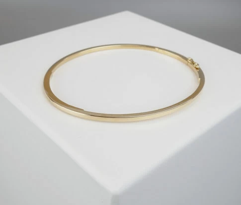 Christian slavenarmband goud