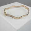 Christian tricolor gouden slavenarmband