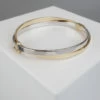 Christian wit en geel gouden slavenarmband