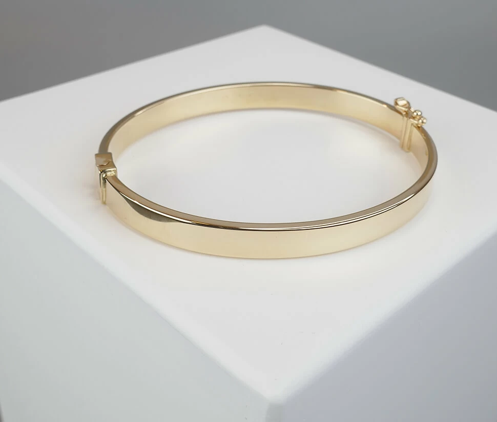 Geel gouden Christian 14 karaat slavenarmband