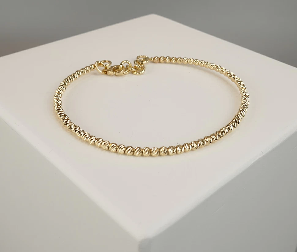 Gouden Christian balletjes armband
